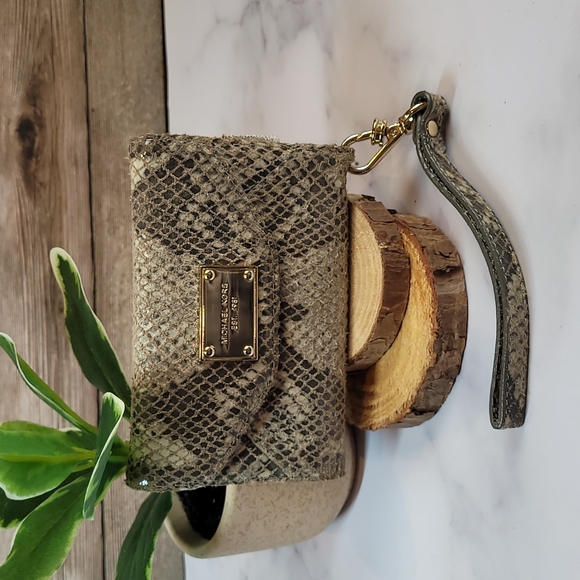 Michael Kors Accessories - MICHAEL KORS SNAKE PRINT  PHONE WRISTLET